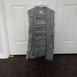 Gray and silver sweater vest with sparkle.